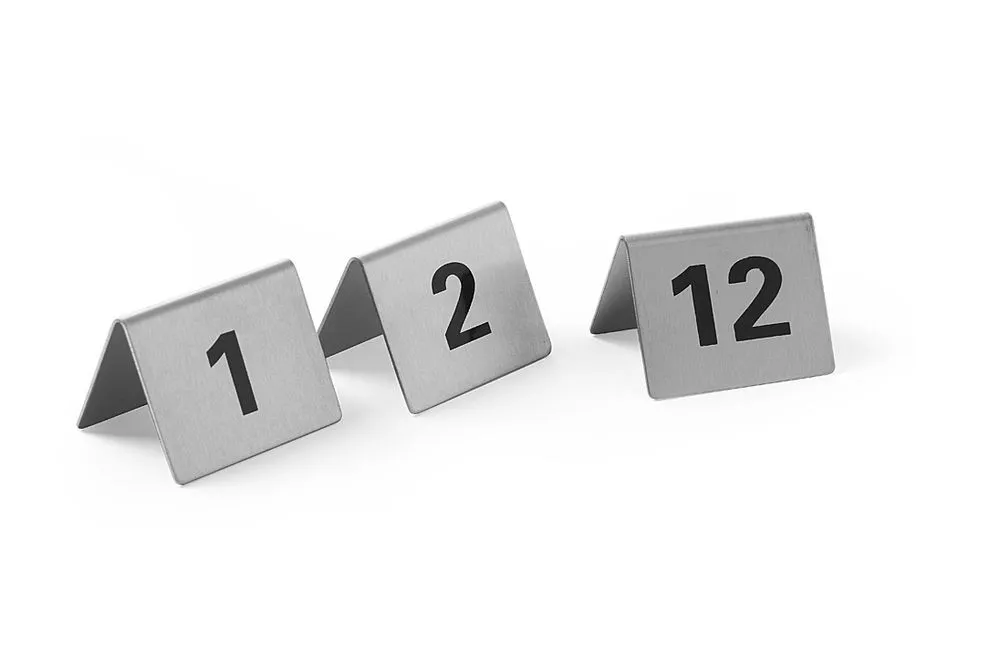 Nabor 12 miznih stojal, oštevilčenih od 1 do 12.